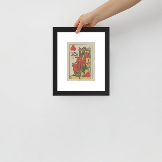 and holding King Solomon artwork framed for scale