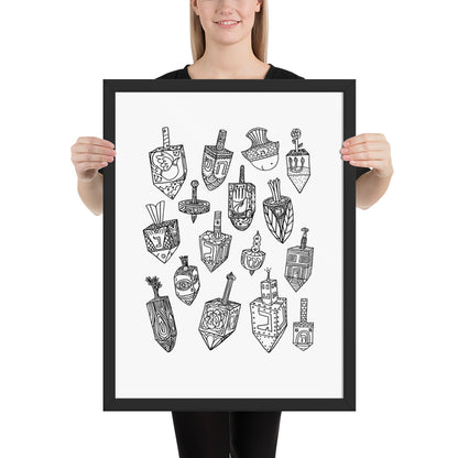 A woman holding the dreidel poster to show the scale of the frame against a standing adult 