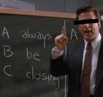 Man in front of a chalkboard with the words Always Be Closing written on it.