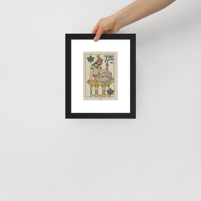 hand holding the Esther poster framed for scale purposes 