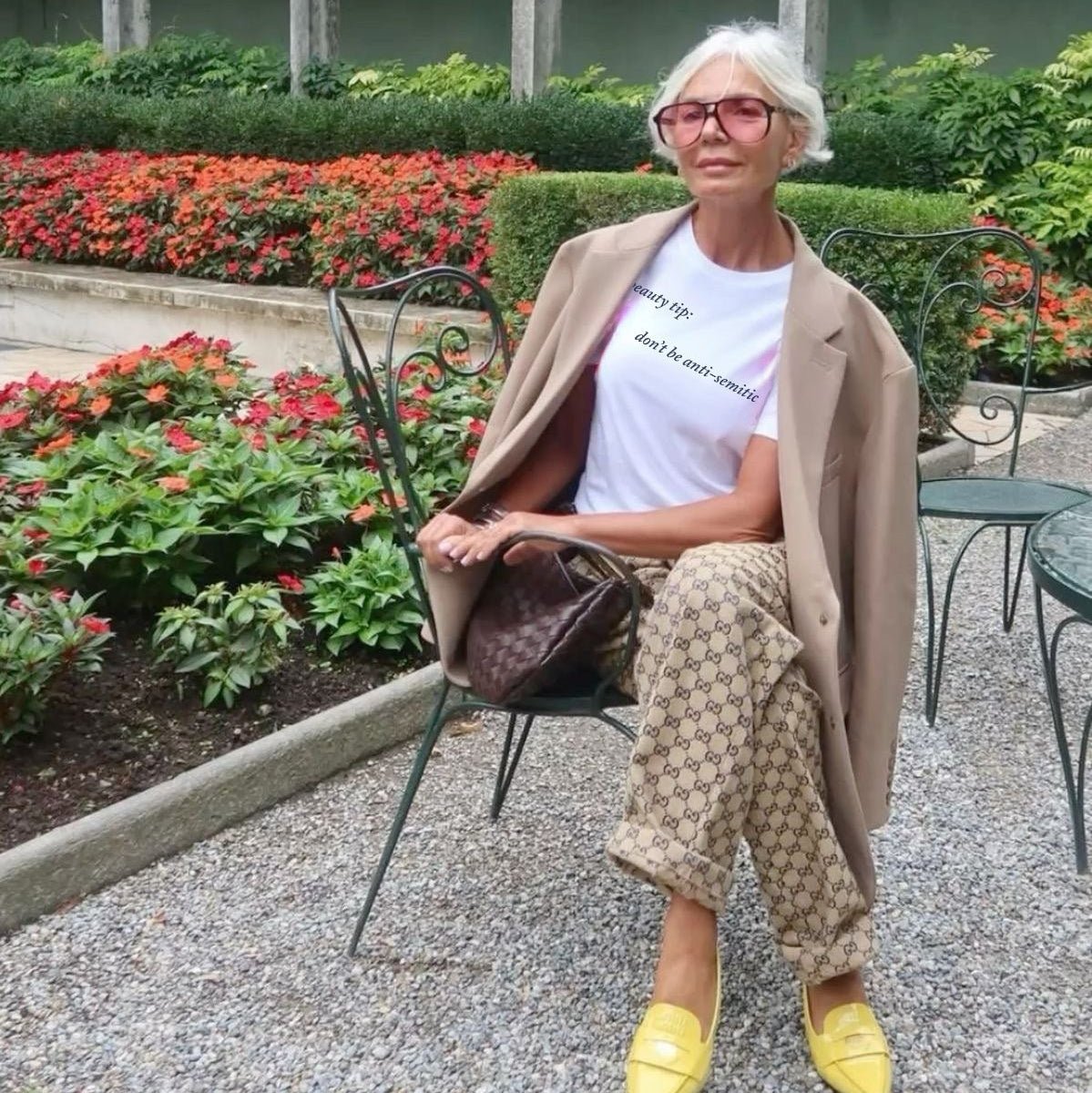 older woman wearing a "Beauty Tip" Don't be anti-Semitic" T-shirt