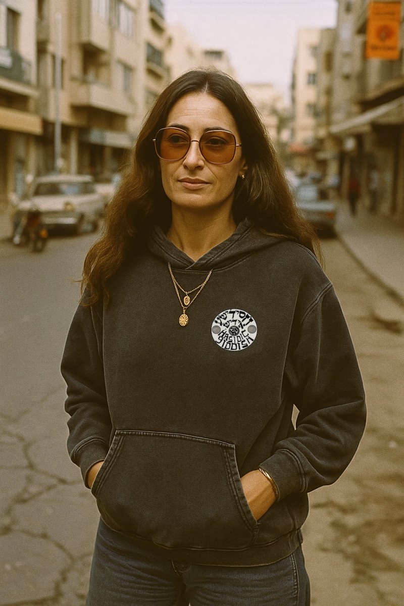 woman wearing the Hasidic Yiddish hoodie in vintage black