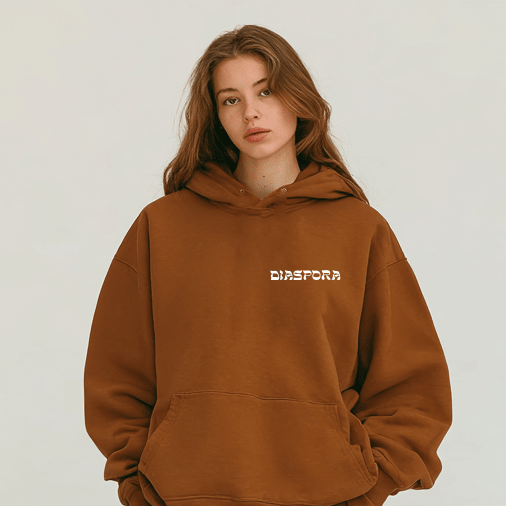 young girl wearing the Jespora hoodie in brown